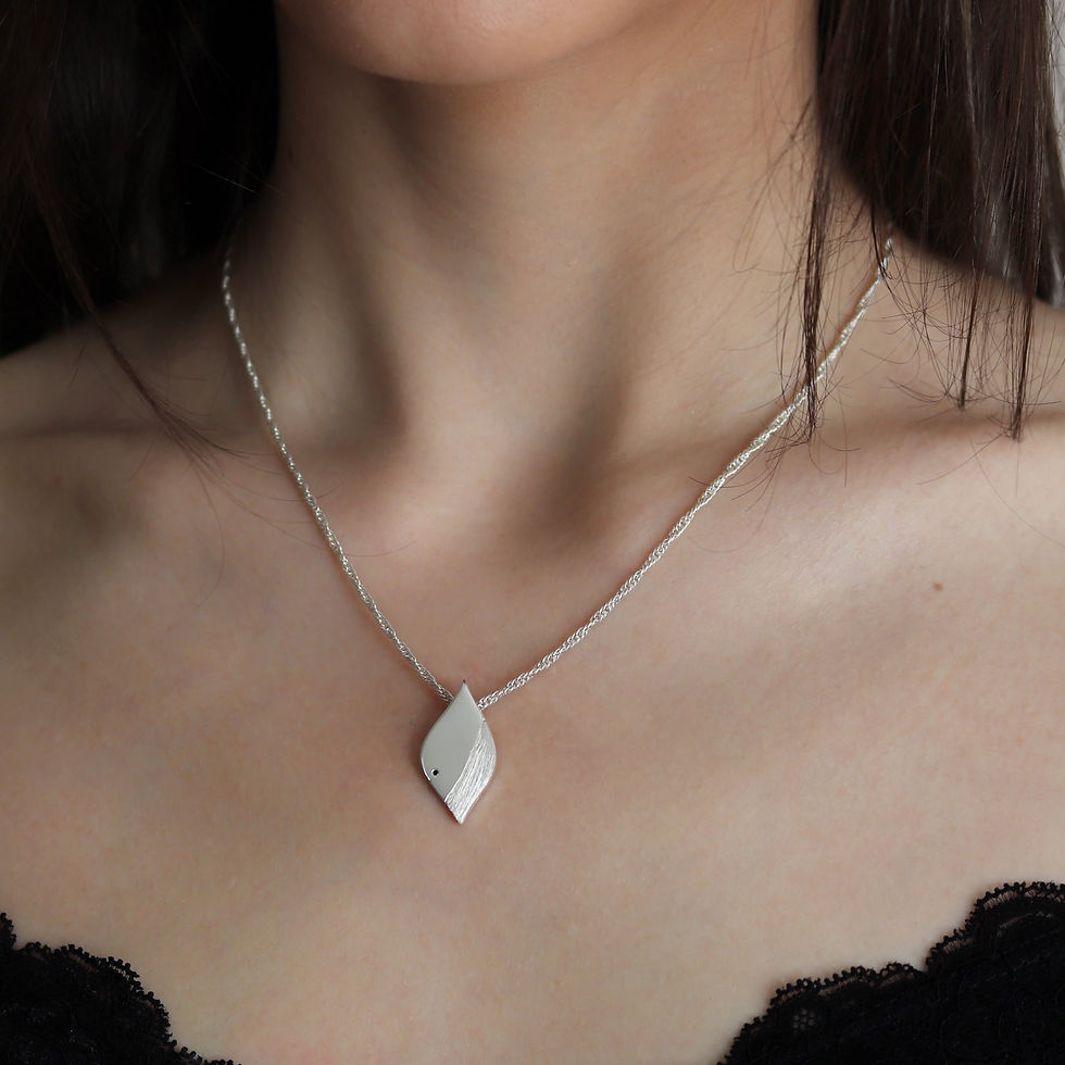 Thumbnail: Silver pendant necklace worn by model