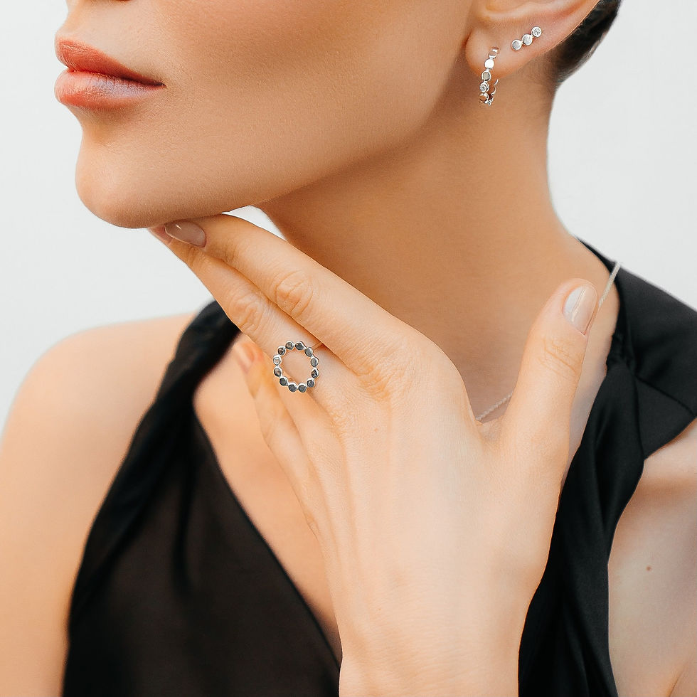 Thumbnail: Sterling silver circle ring set with a single clear cubic zirconia
