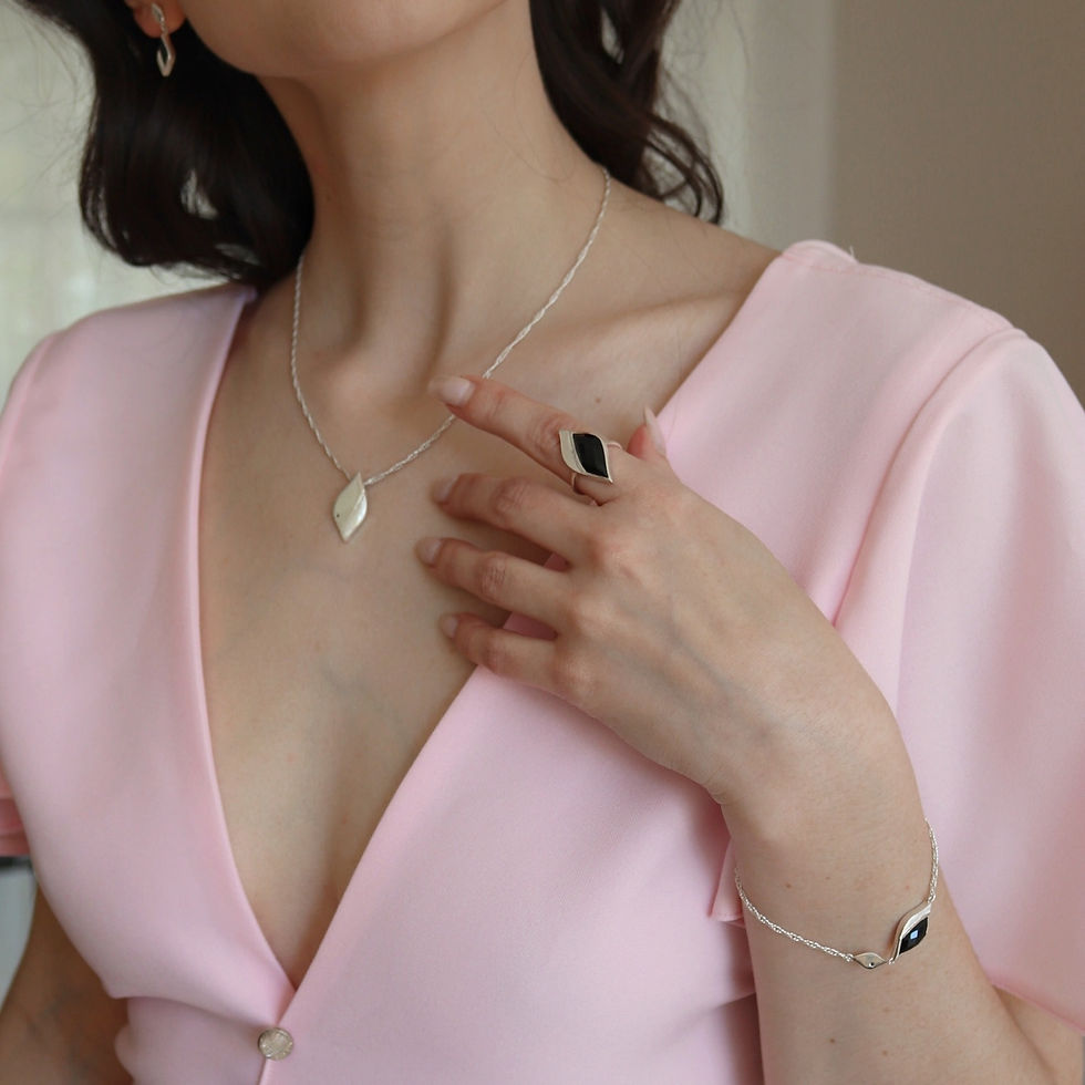 Thumbnail: Silver pendant necklace worn by model