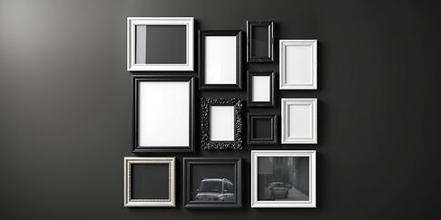 A variety of black and white poster frame molds with glass insert.jpg