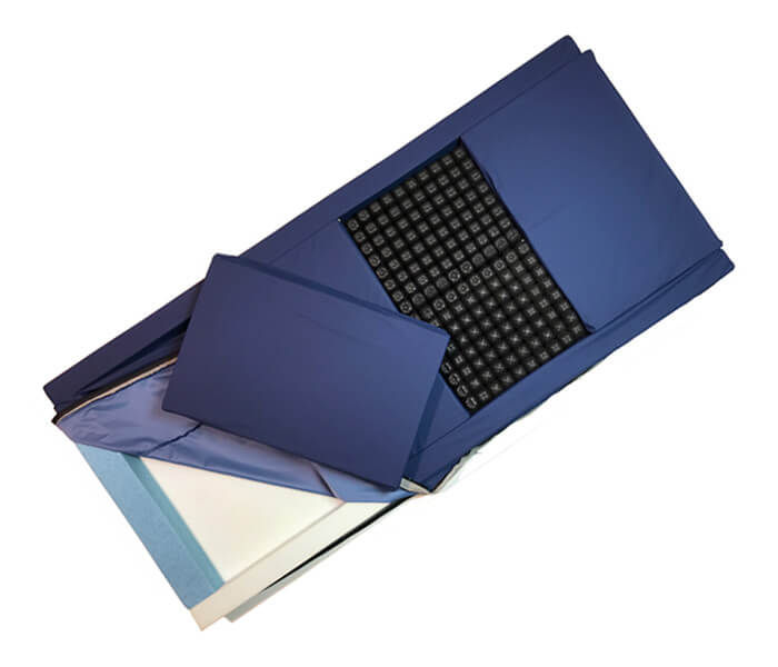 5 Minds Mobility Adapt 2 modular mattress opened to show its foam and ROHO sections on a white background