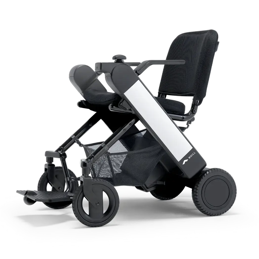 WHILL Model F folding power wheelchair with white arm covers, side view on a white background