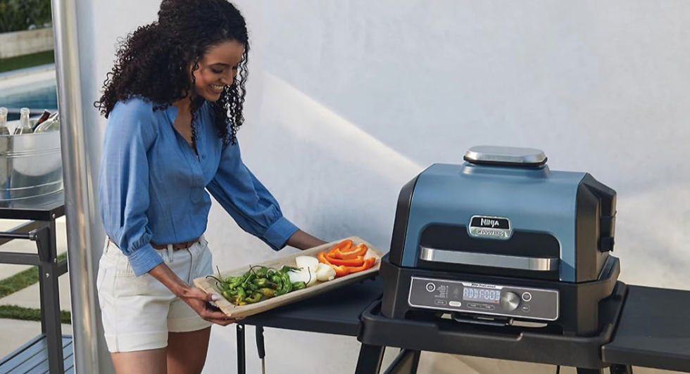 Woman grilling with a ninja grill
