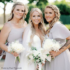 Bride with bridal party wearing elegant, natural makeup by AN Artistry at Triple S Ranch before the ceremony.