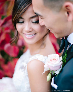 Bride smiling in finished soft glam wedding makeup and natural hairstyle by AN Artistry makeup artist.