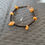 Thumbnail: Bracelet perles noires et pierres naturelles semi précieuses aventurine jaune