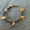 Thumbnail: Bracelet perles noires et pierres naturelles semi précieuses aventurine jaune