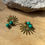 Thumbnail: Paire de boucles d'oreilles pendantes avec perles marbrées vertes