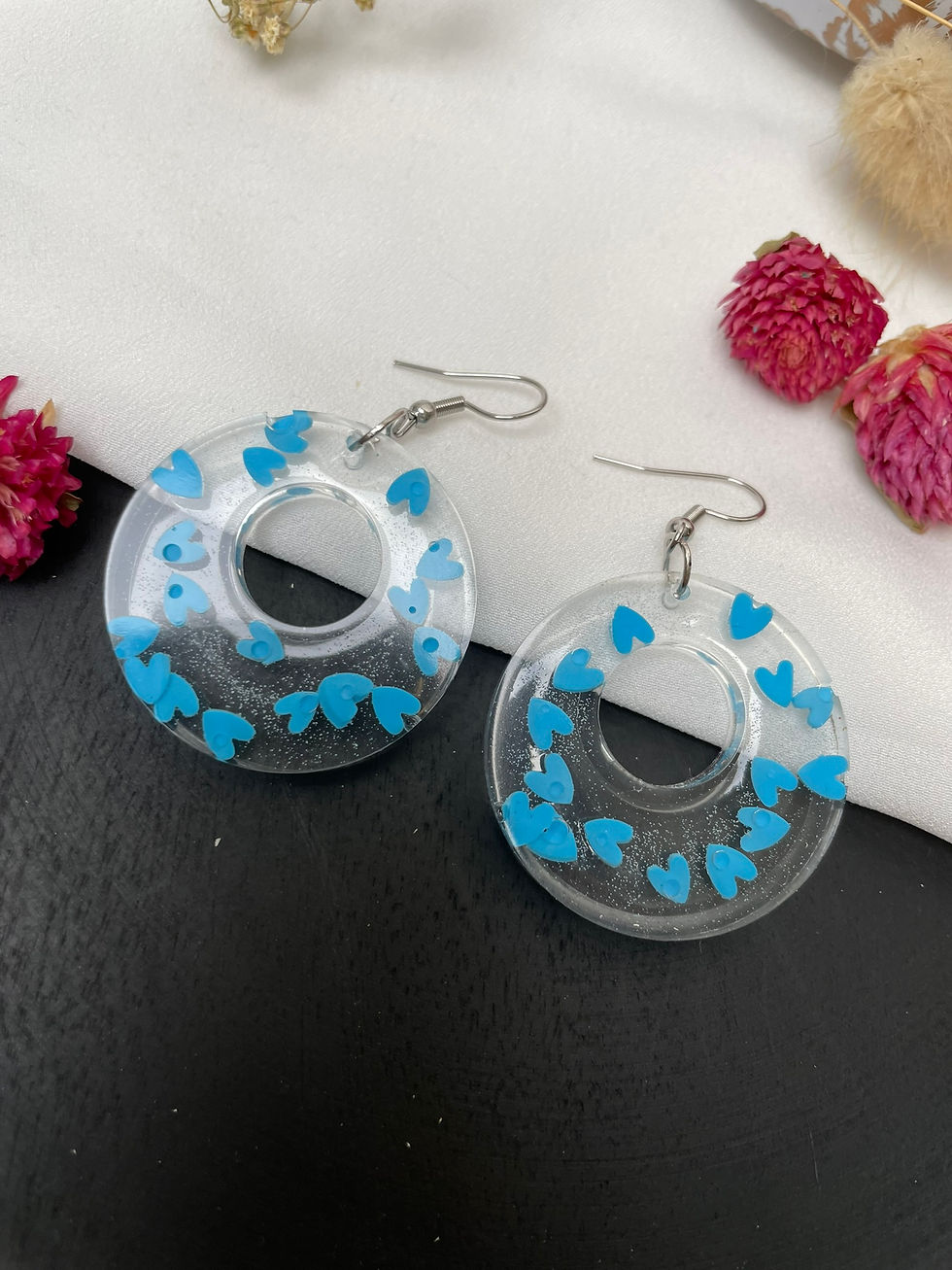 Thumbnail: Boucles d'oreilles cœurs bleu