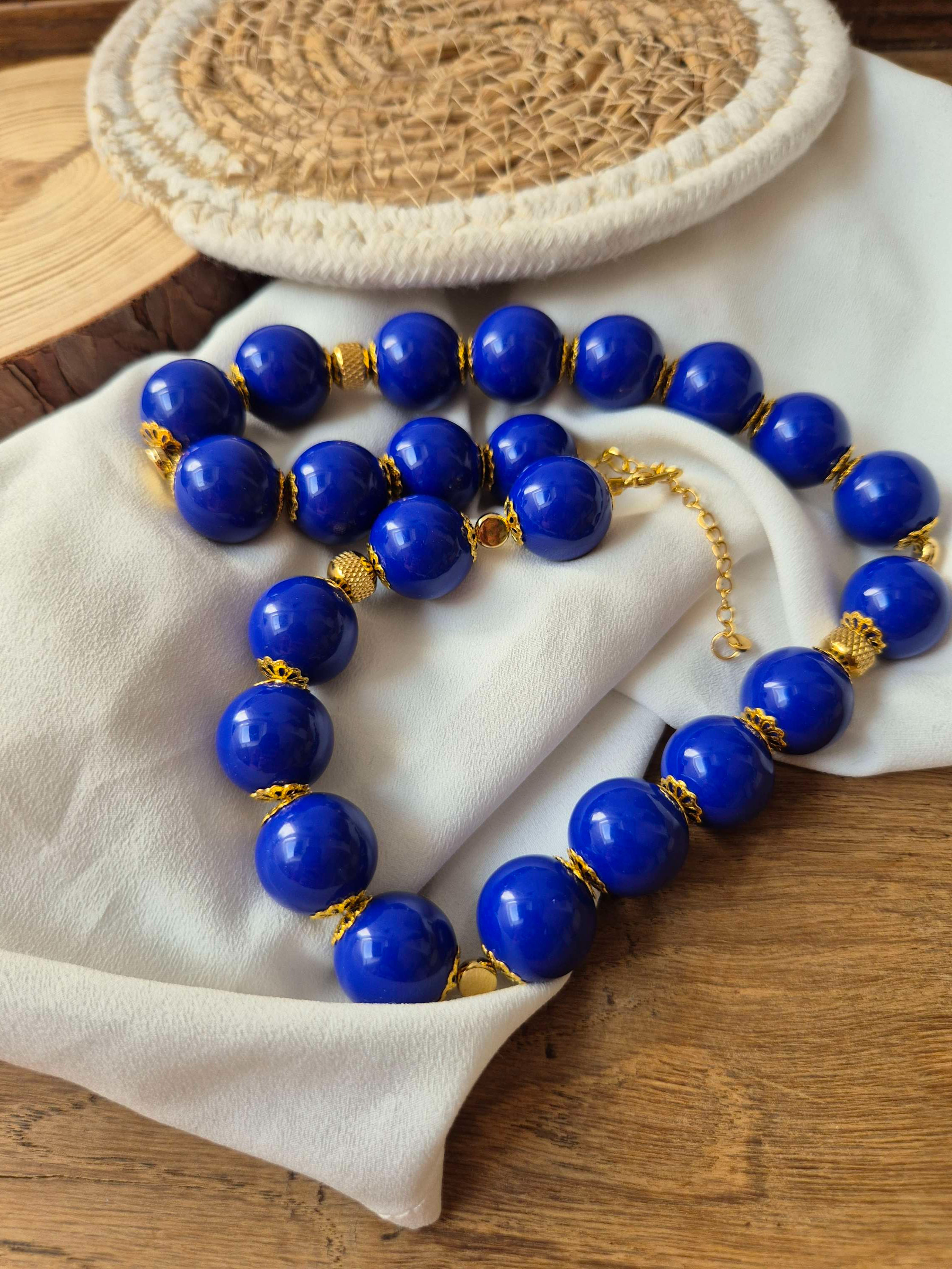 Collier perles bleues et dorées