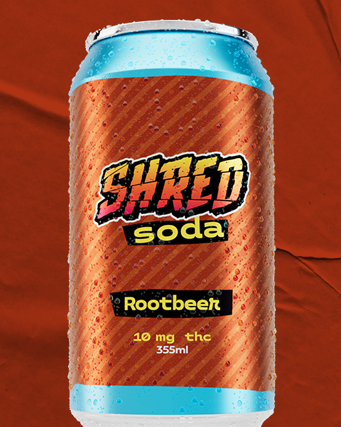 A dark orange aluminum can of SHRED Soda Rootbeer