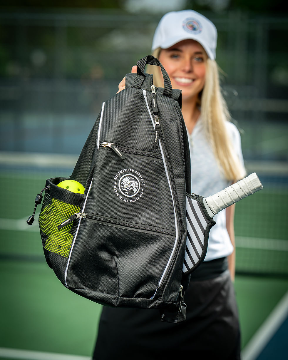 Black pickleball bag with paddle storage and front zip pocket