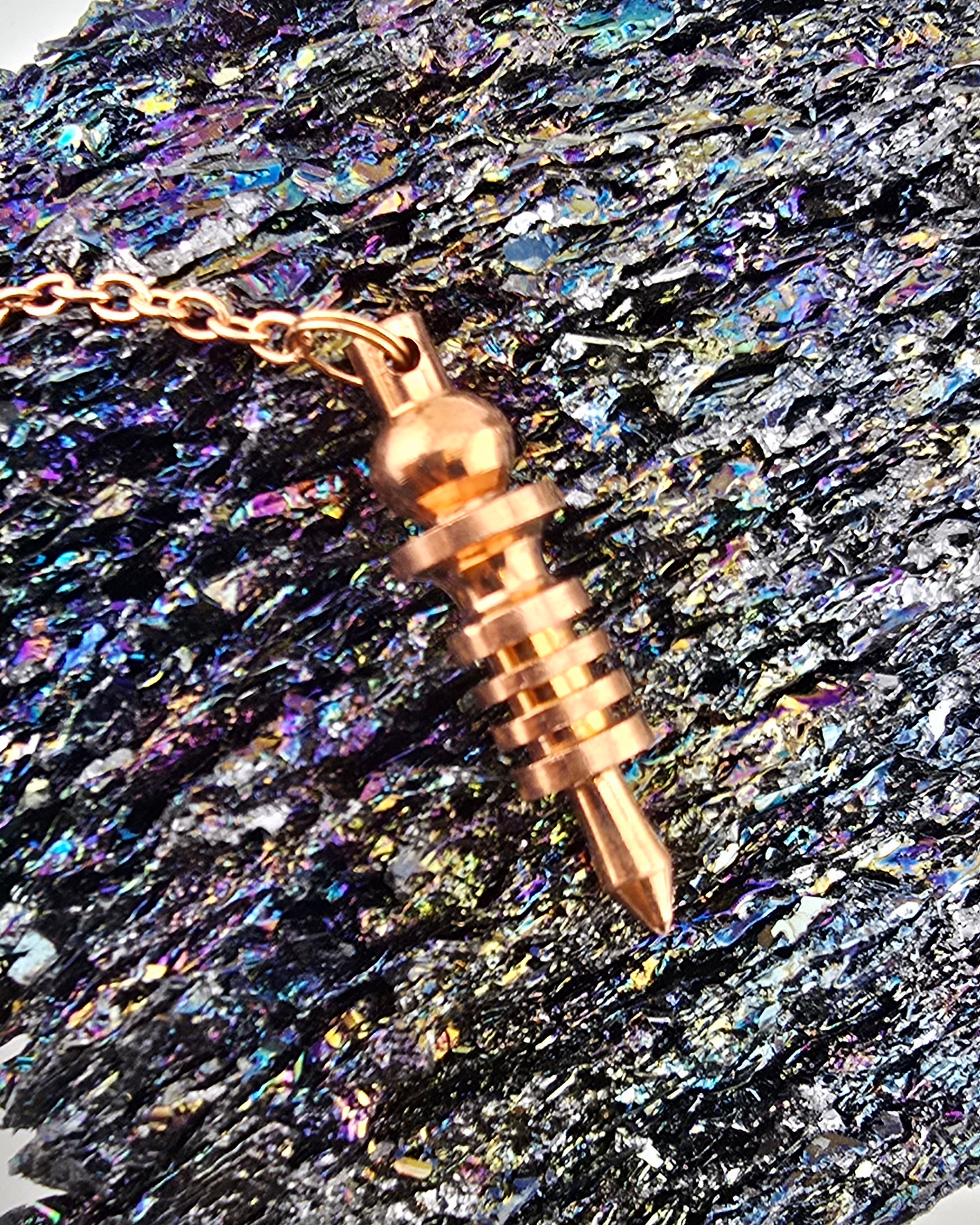 {energized} 5 Ring Copper Pendulum