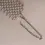 Miniatura: Cinturón de cuentas de perlas hecho a mano con detalle de hebilla esculpida
