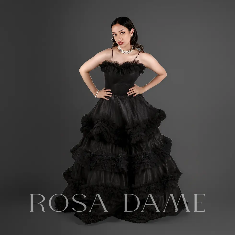 Black layered tulle ruffle ball gown with corset bodice and voluminous skirt