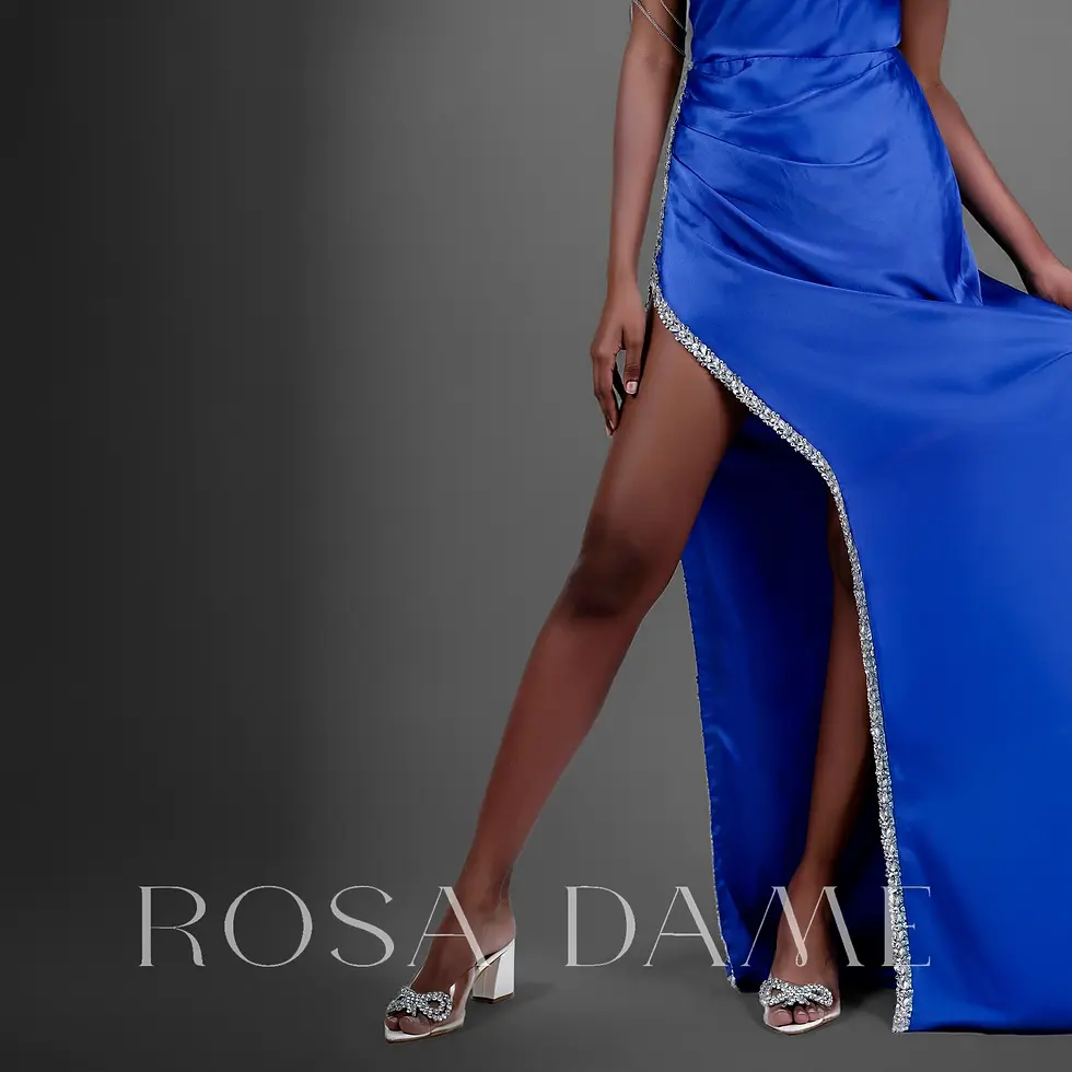 Royal blue satin gown back view with fitted silhouette and slit