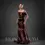 Thumbnail: Side profile of chocolate brown satin mermaid evening gown with sculpted waist and flared hem
