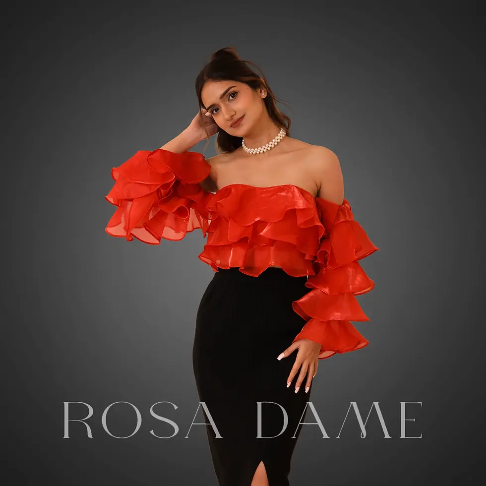 close view of dramatic layered organza sleeves in red corset top