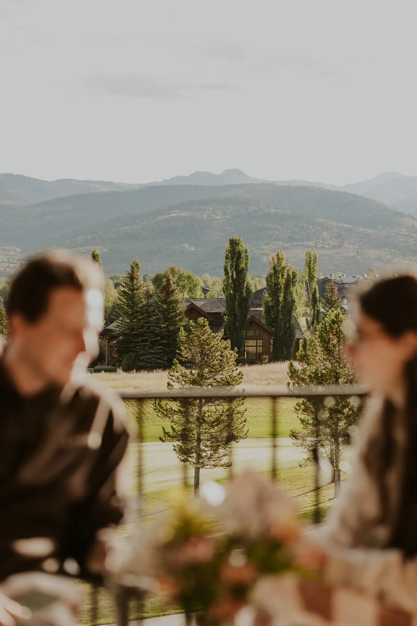 couple sitting on balcony in victor idaho