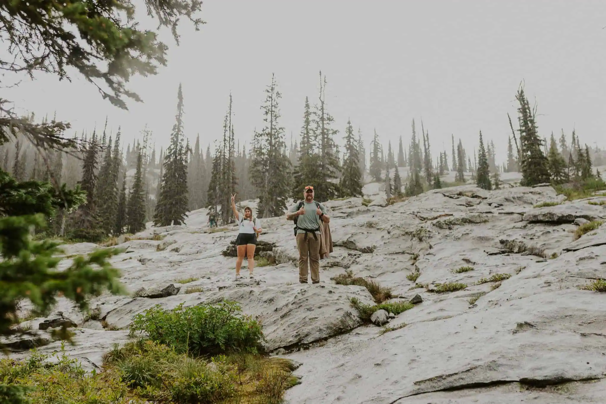couple hiking in the rain