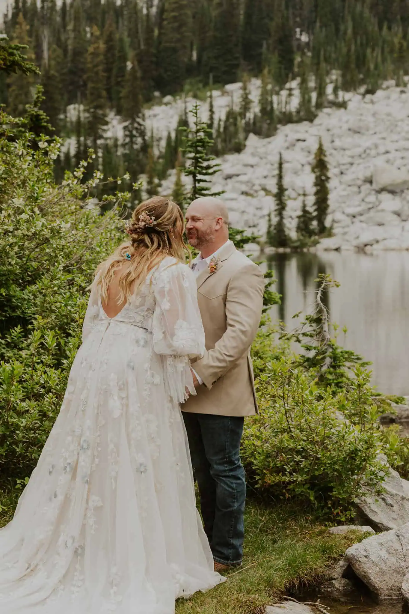 bride and groom first look in the mountains
