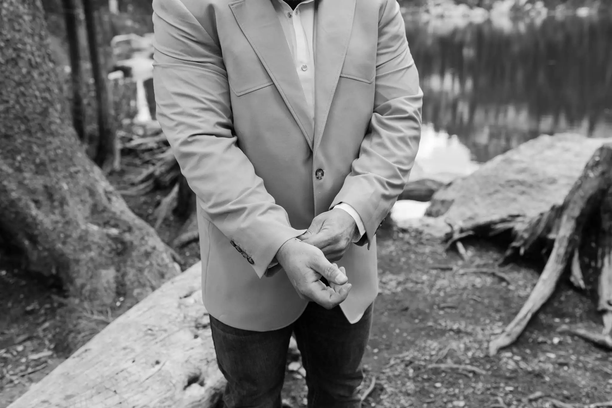 groom putting on his suit