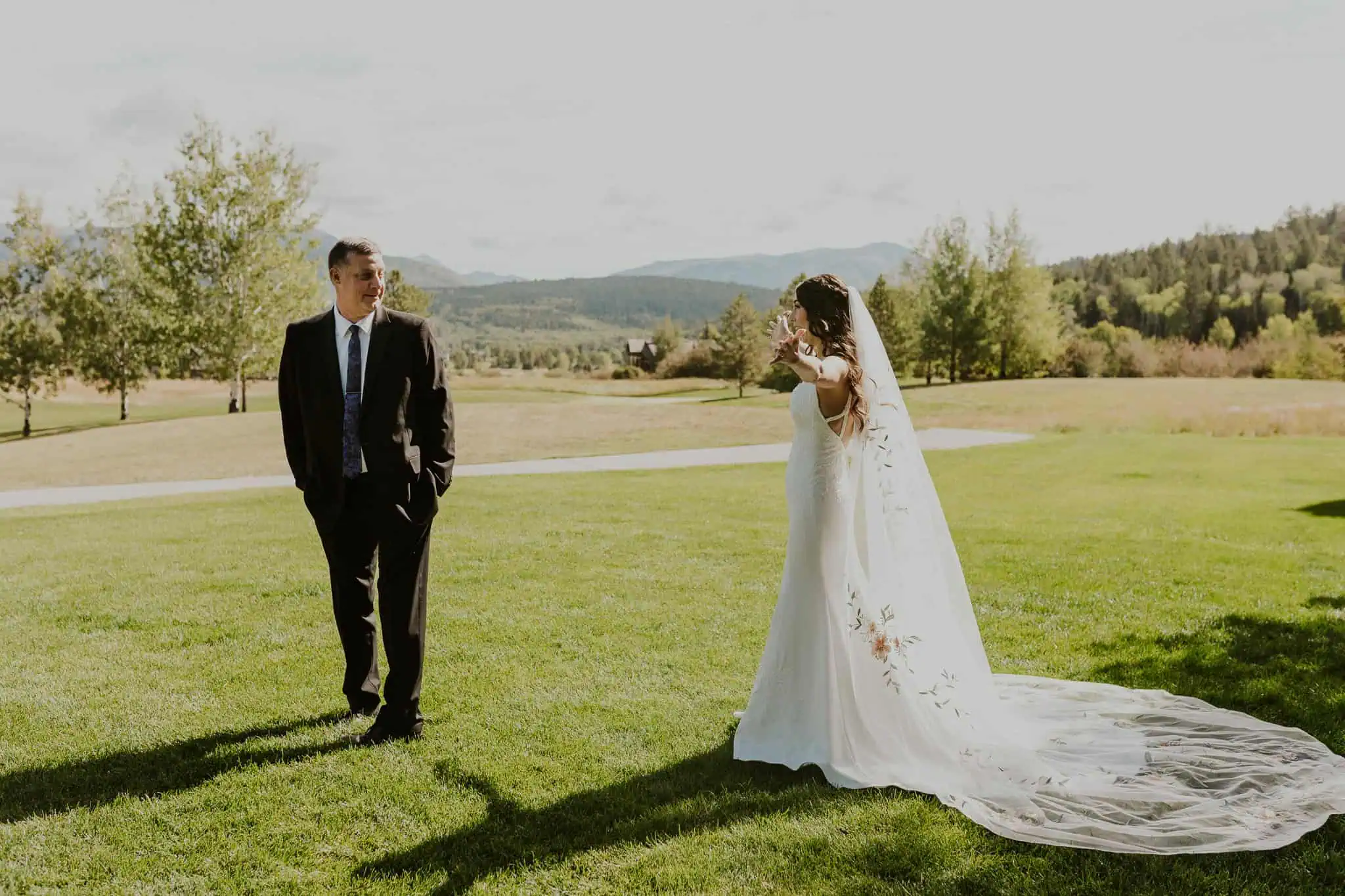 bride's first look in a backyard