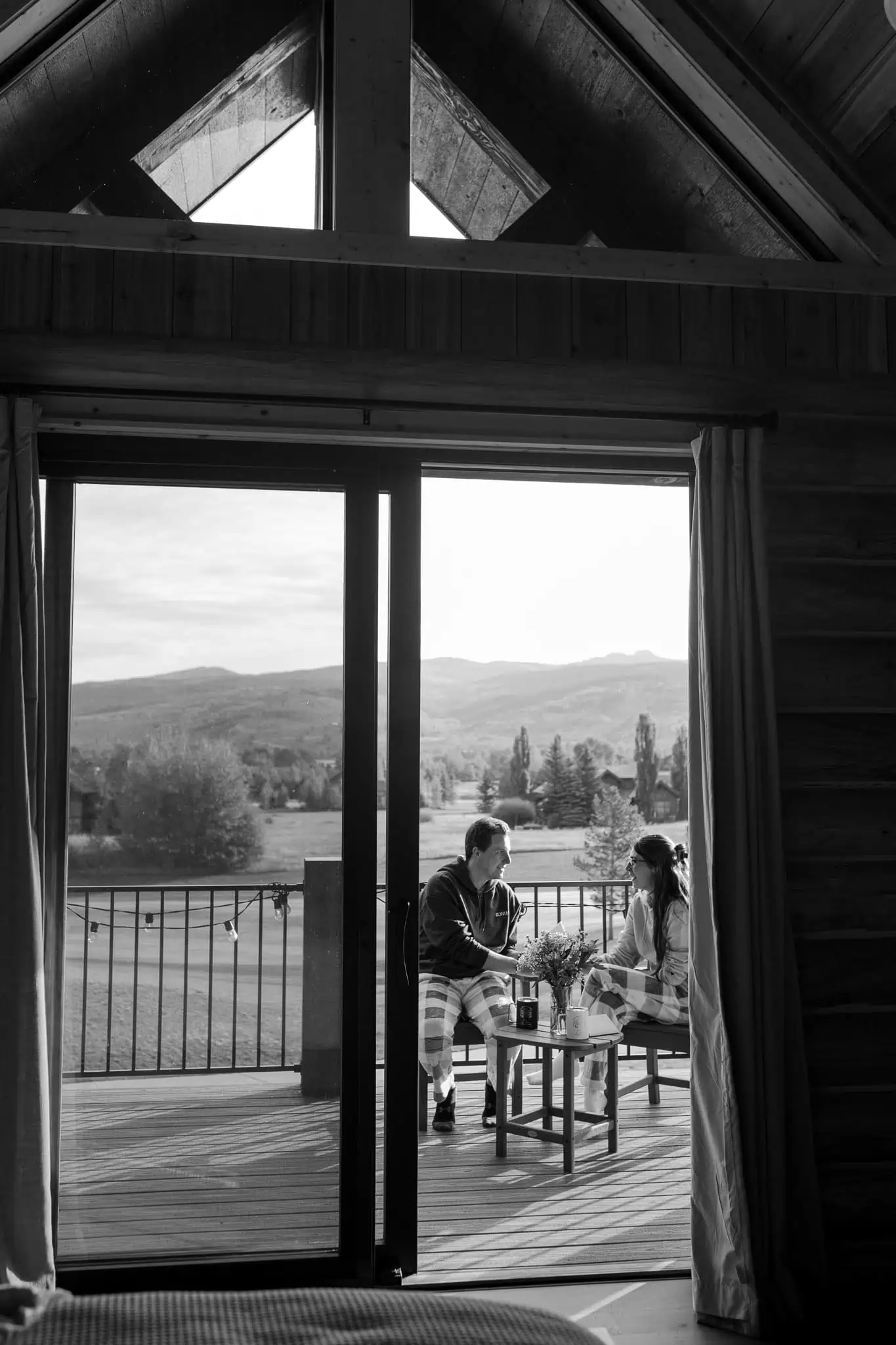 couple sitting on a balcony together