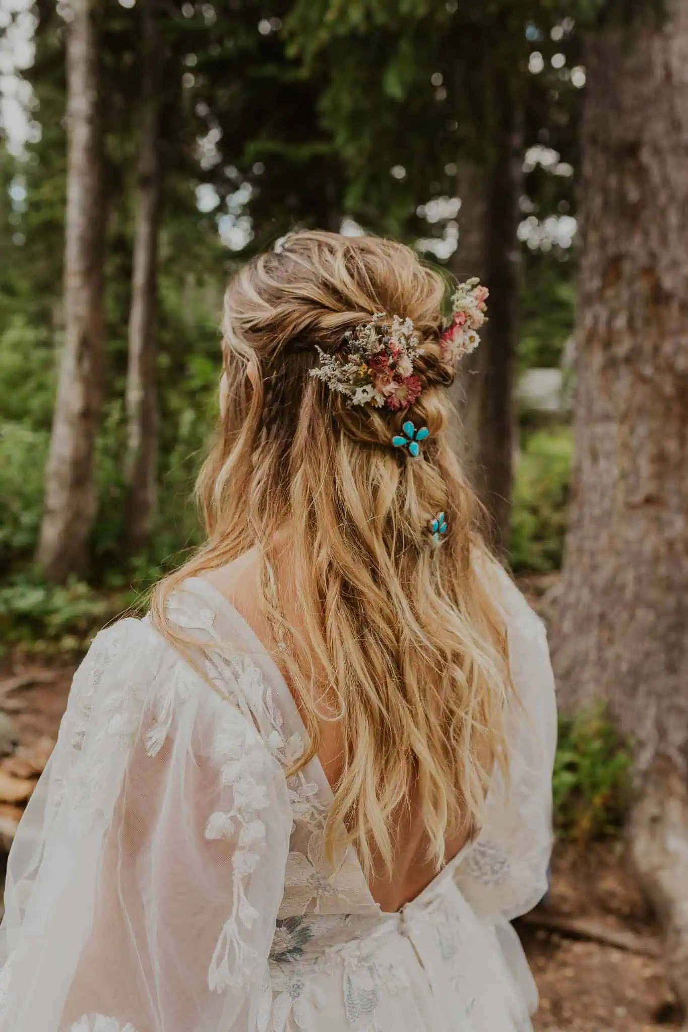 a boho half up do for a mountain elopement