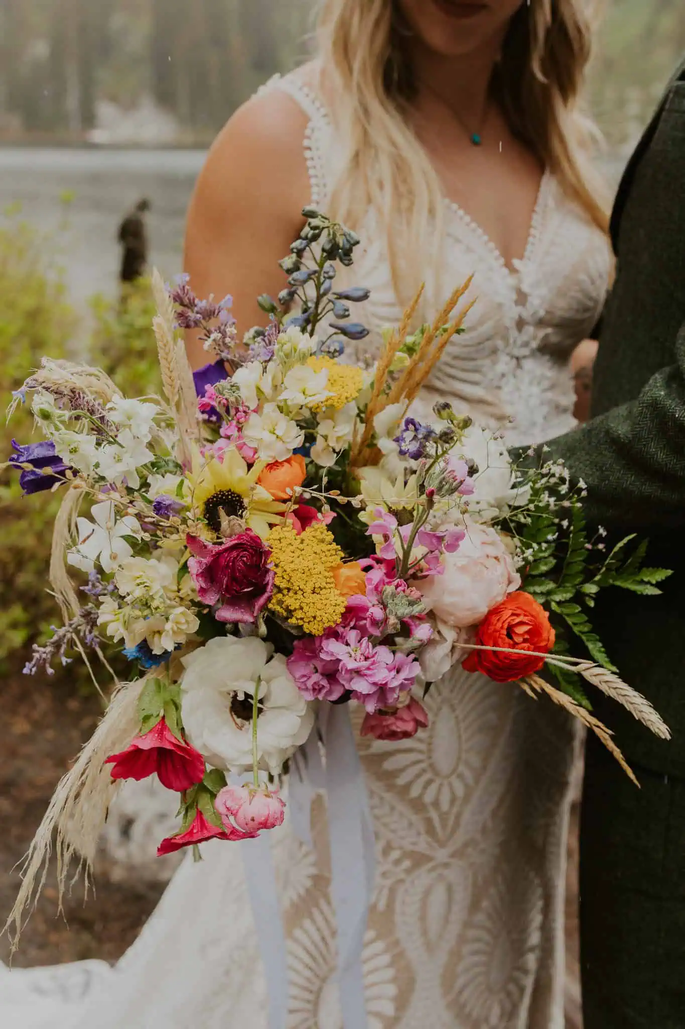 an up close photo of a colorful bouquet by beehaven flowers