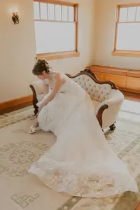bride putting on shoes