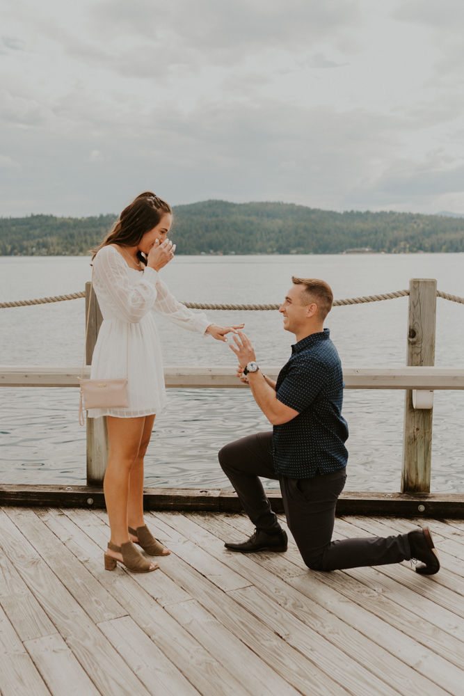 surprise proposal on the coeur d'alene resort boardwalk in north idaho, karlie larson photography