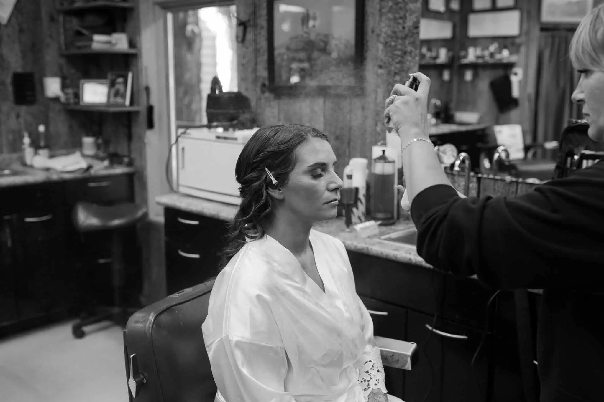 a bride getting her makeup done