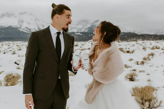 couple cheering with burritos
