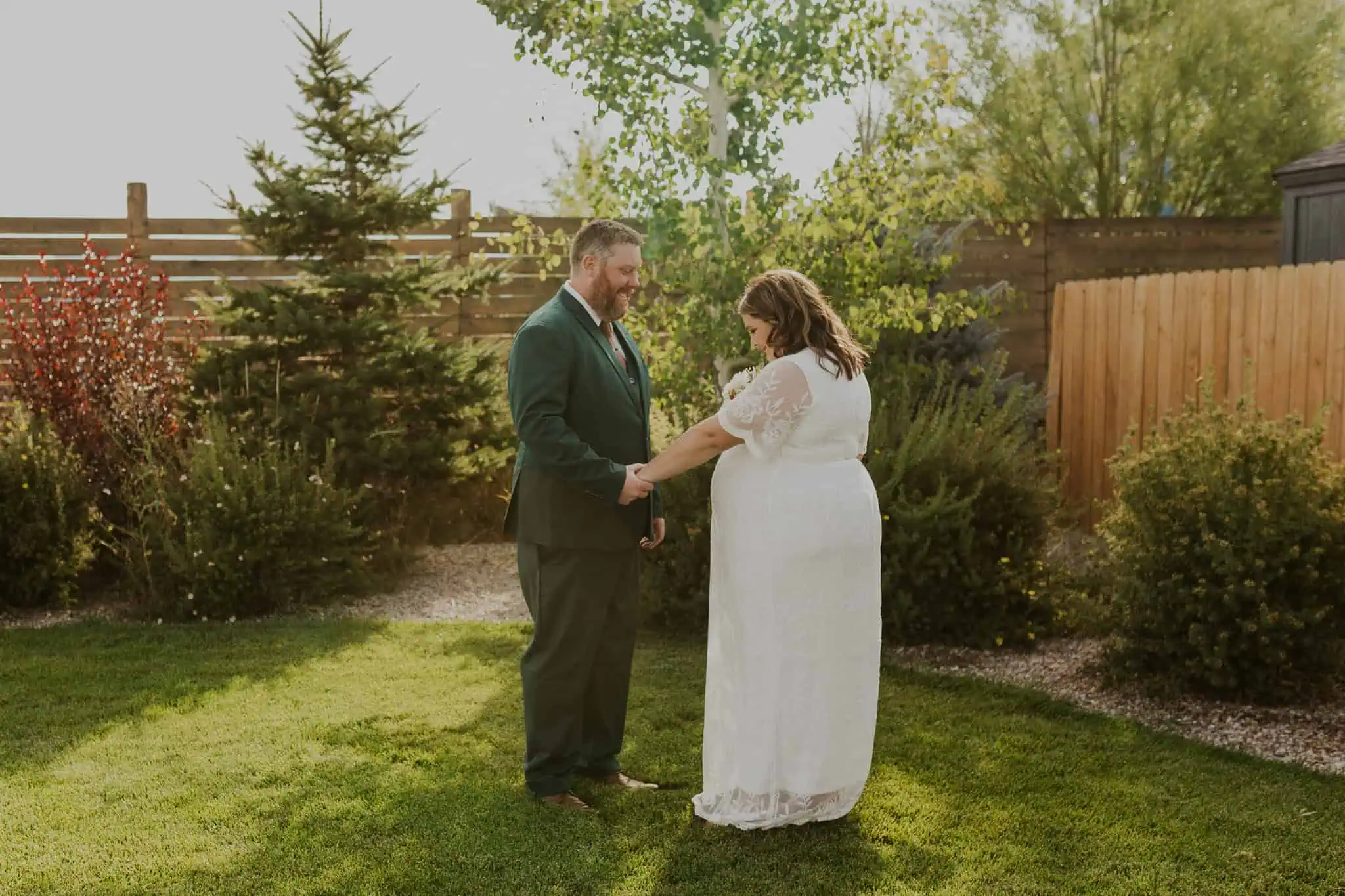 wedding first look in backyard of airbnb