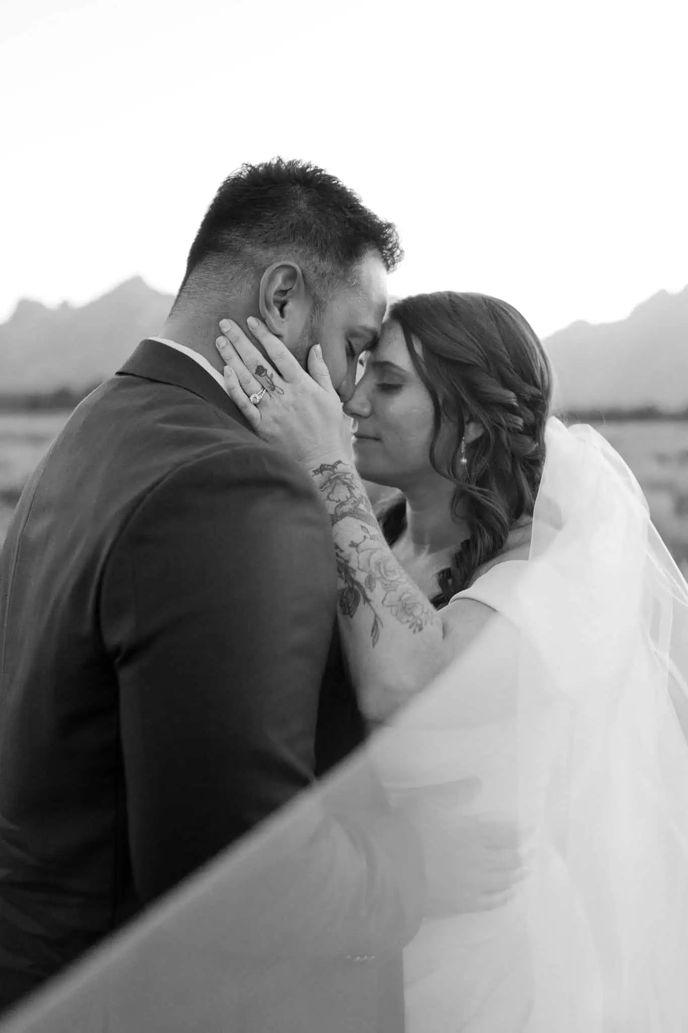 bridal portraits in the tetons under a bride's veil