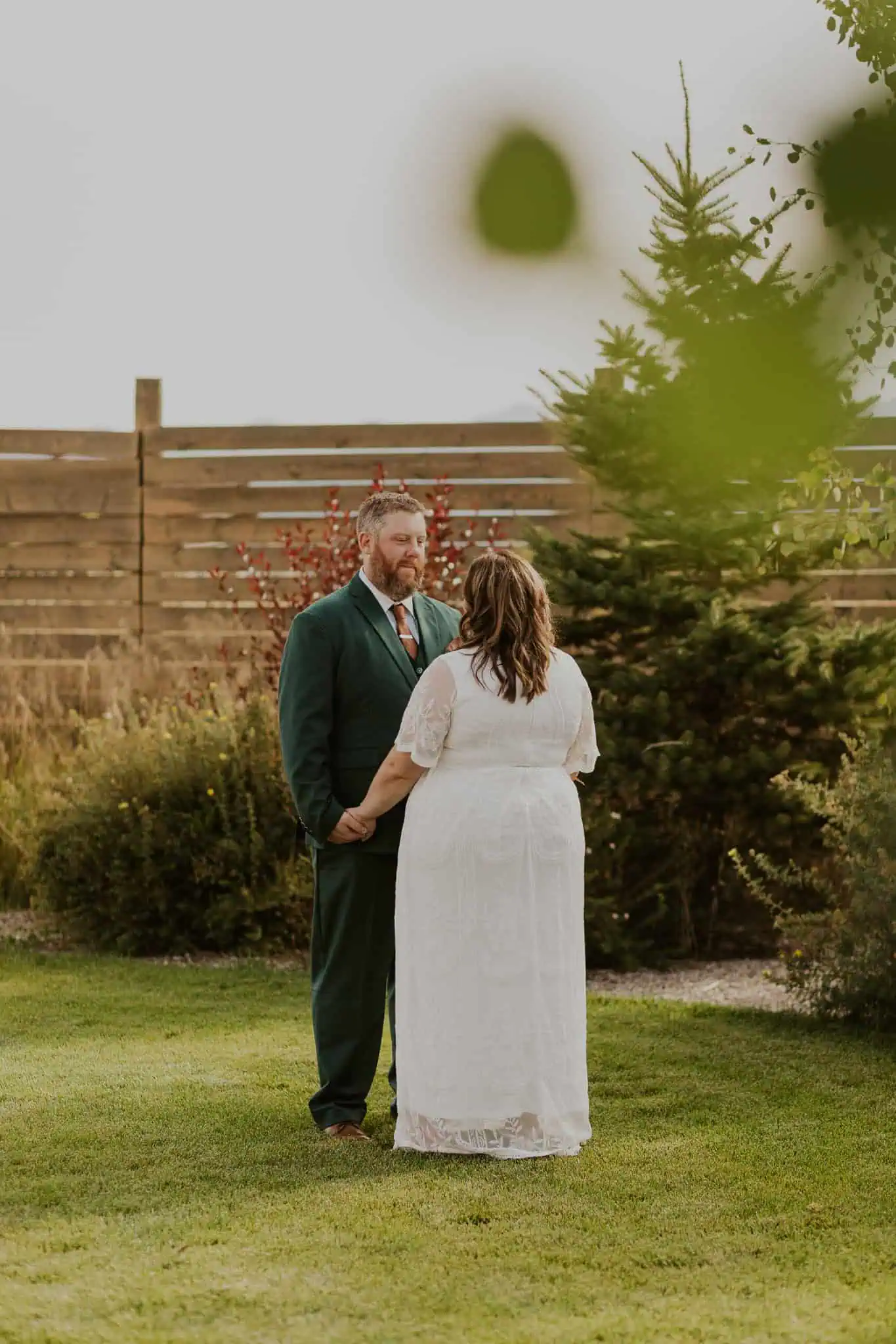 wedding first look in backyard of airbnb