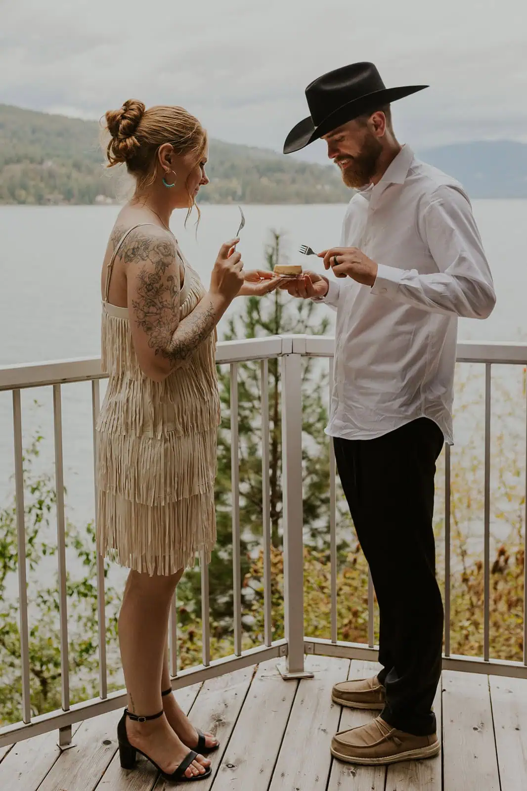 couple sharing a mini cheesecake