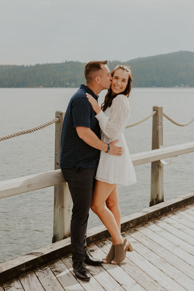 surprise proposal on the coeur d'alene resort boardwalk in north idaho, karlie larson photography