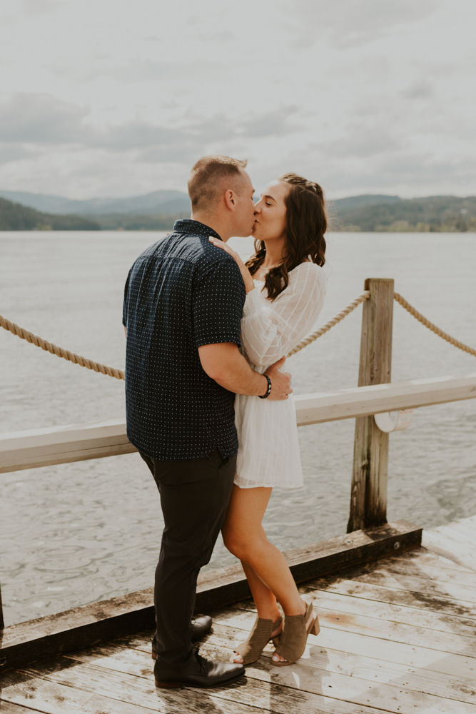 surprise proposal on the coeur d'alene resort boardwalk in north idaho, karlie larson photography