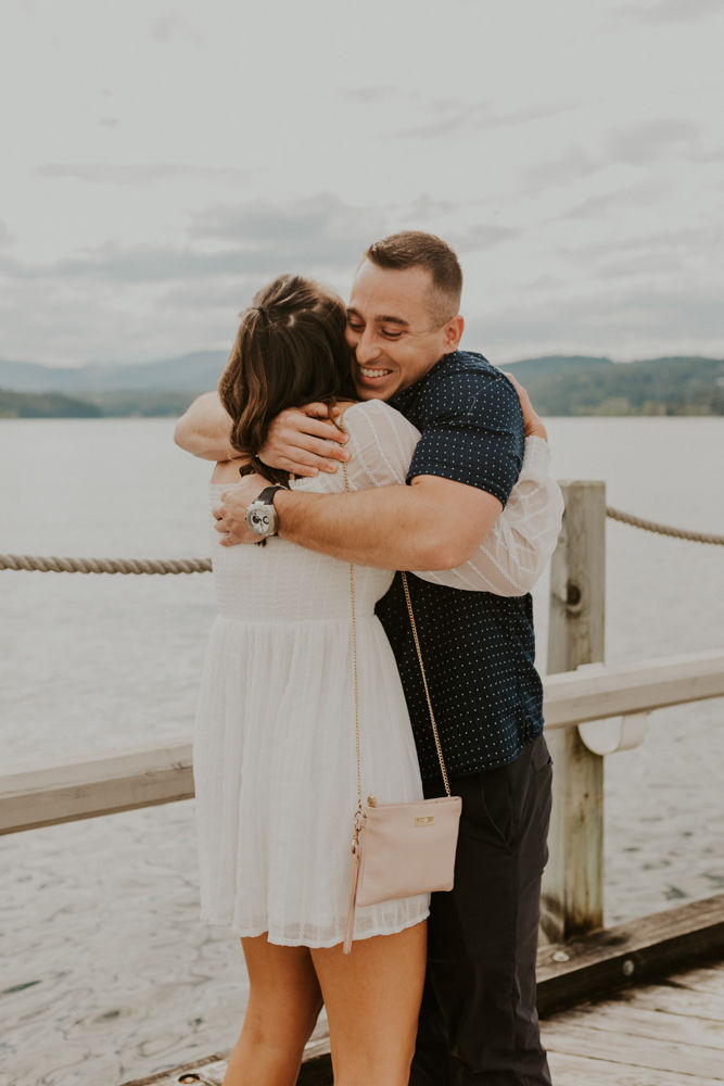 surprise proposal on the coeur d'alene resort boardwalk in north idaho, karlie larson photography