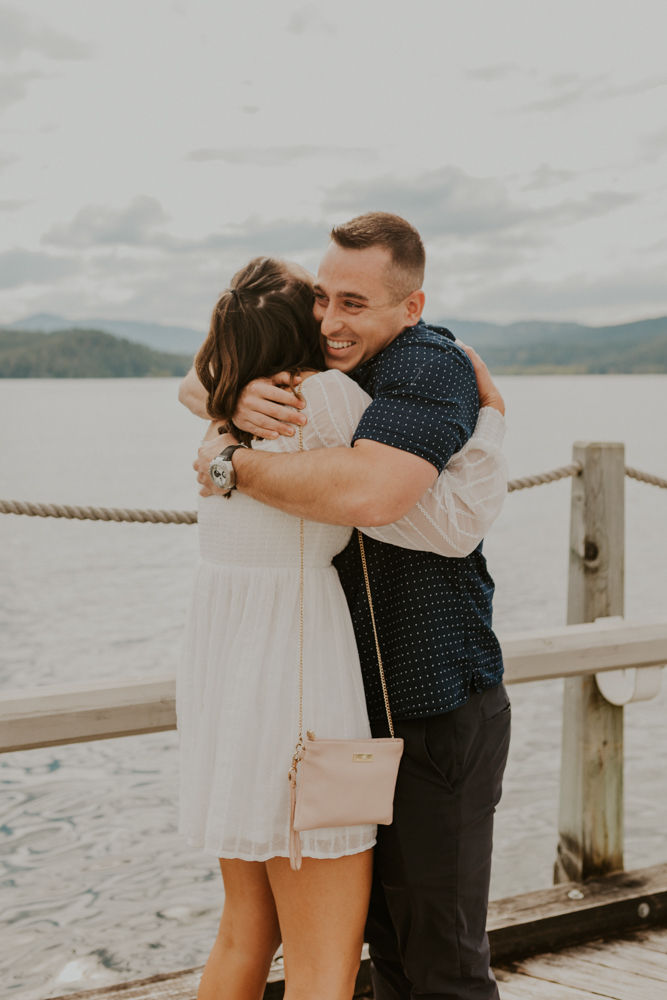 surprise proposal on the coeur d'alene resort boardwalk in north idaho, karlie larson photography
