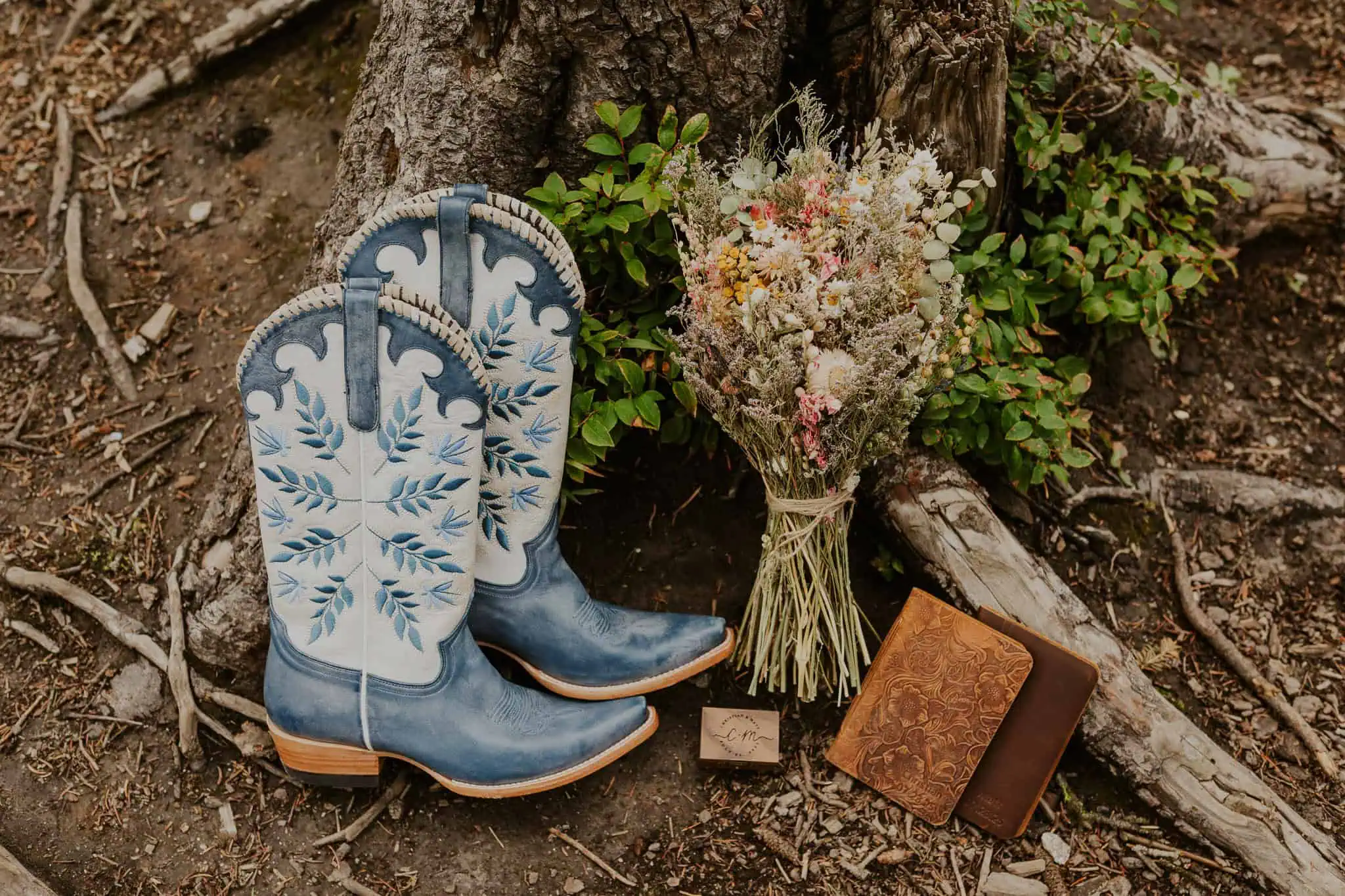 elopement details with blue boots