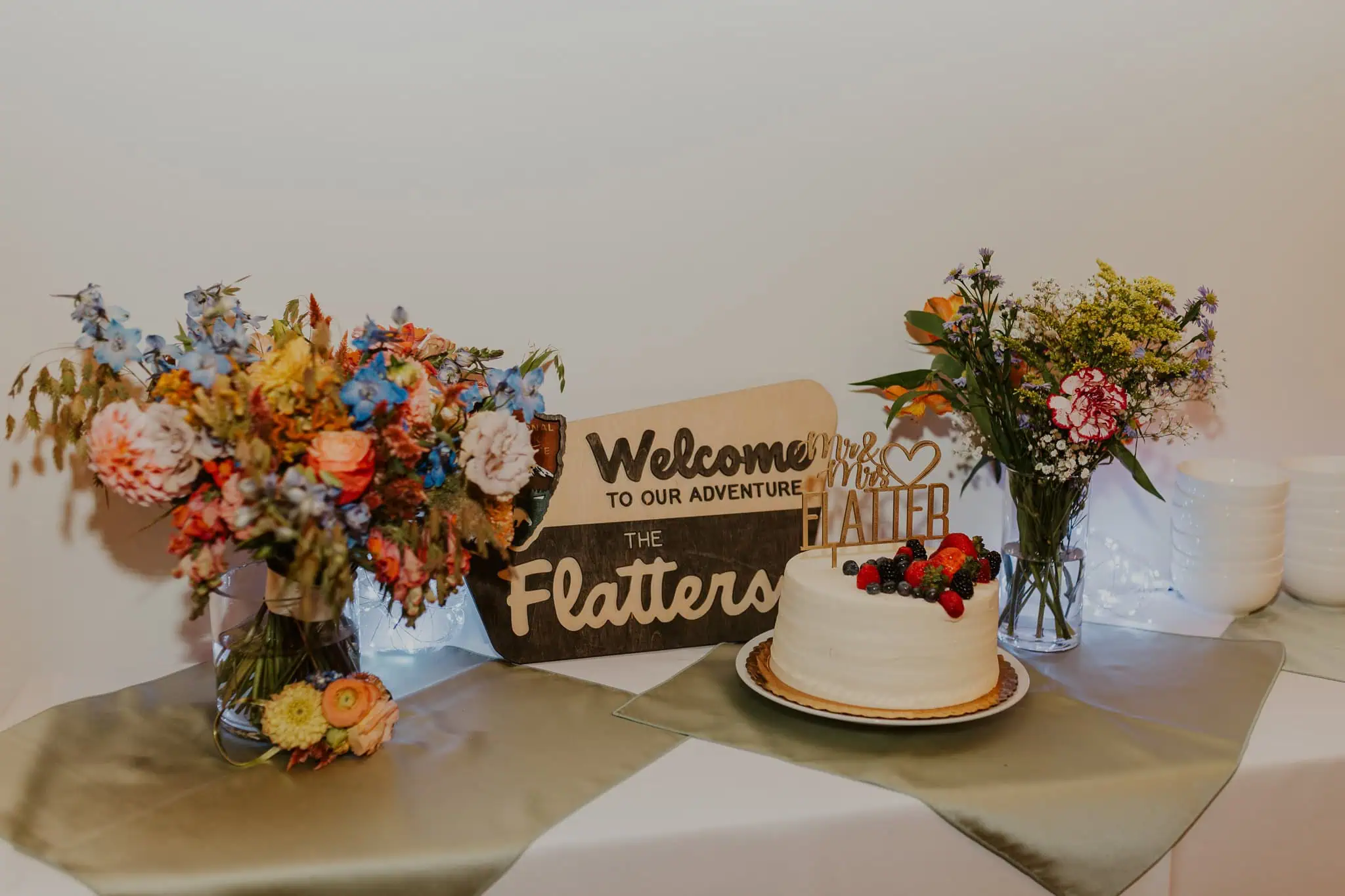 dessert table with cake and national park sign