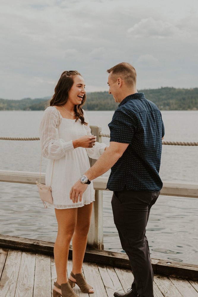 surprise proposal on the coeur d'alene resort boardwalk in north idaho, karlie larson photography
