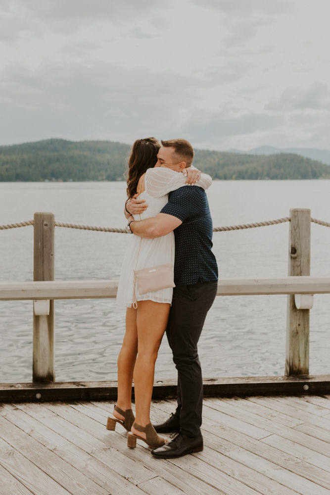 surprise proposal on the coeur d'alene resort boardwalk in north idaho, karlie larson photography