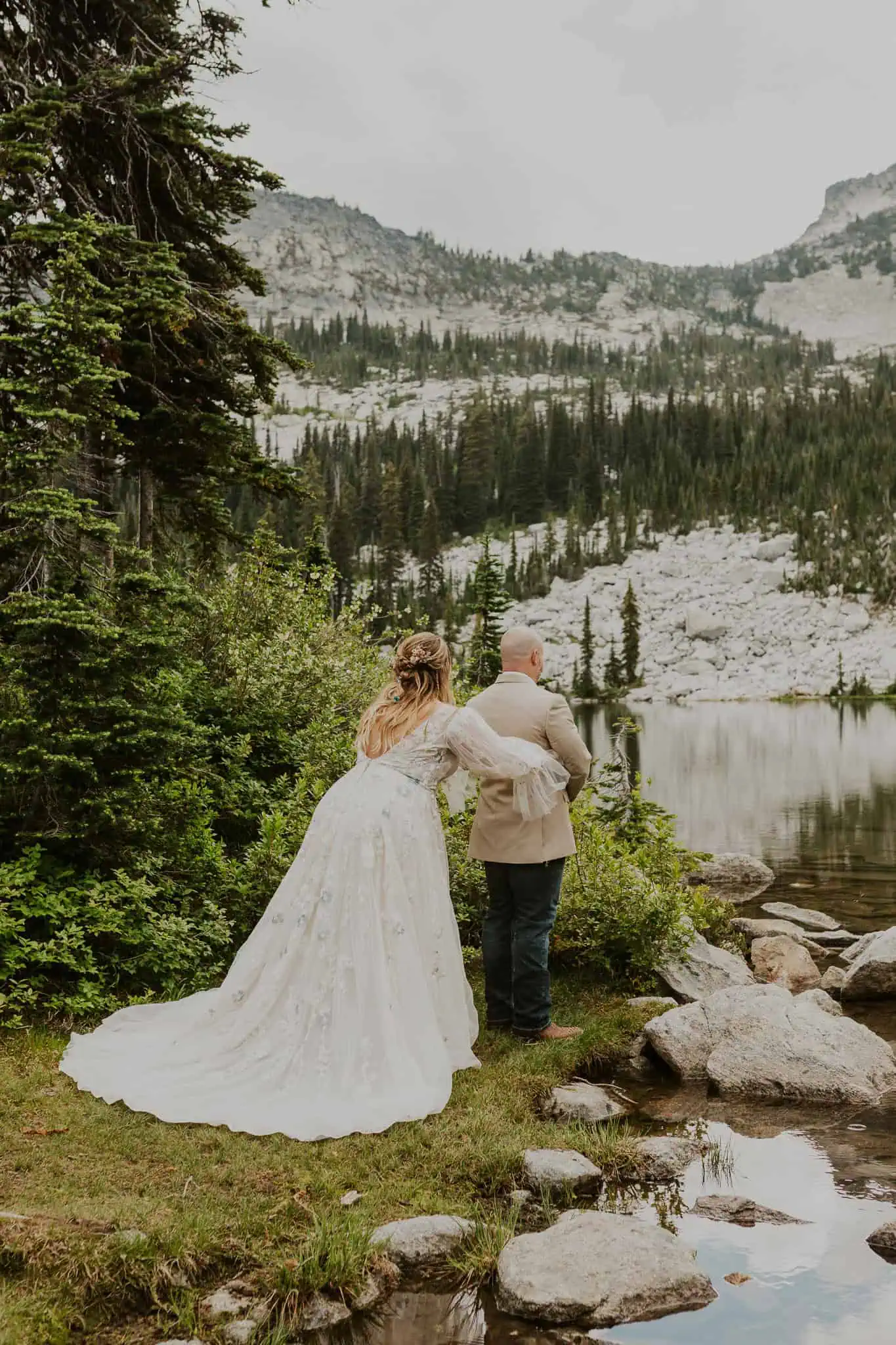 bride and groom first look in the mountains
