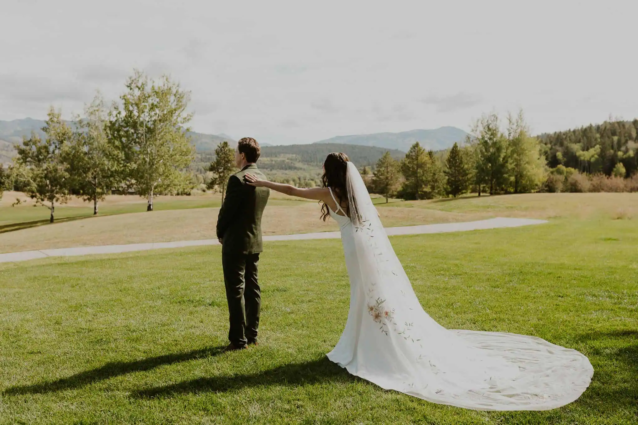 bride's first look in a backyard