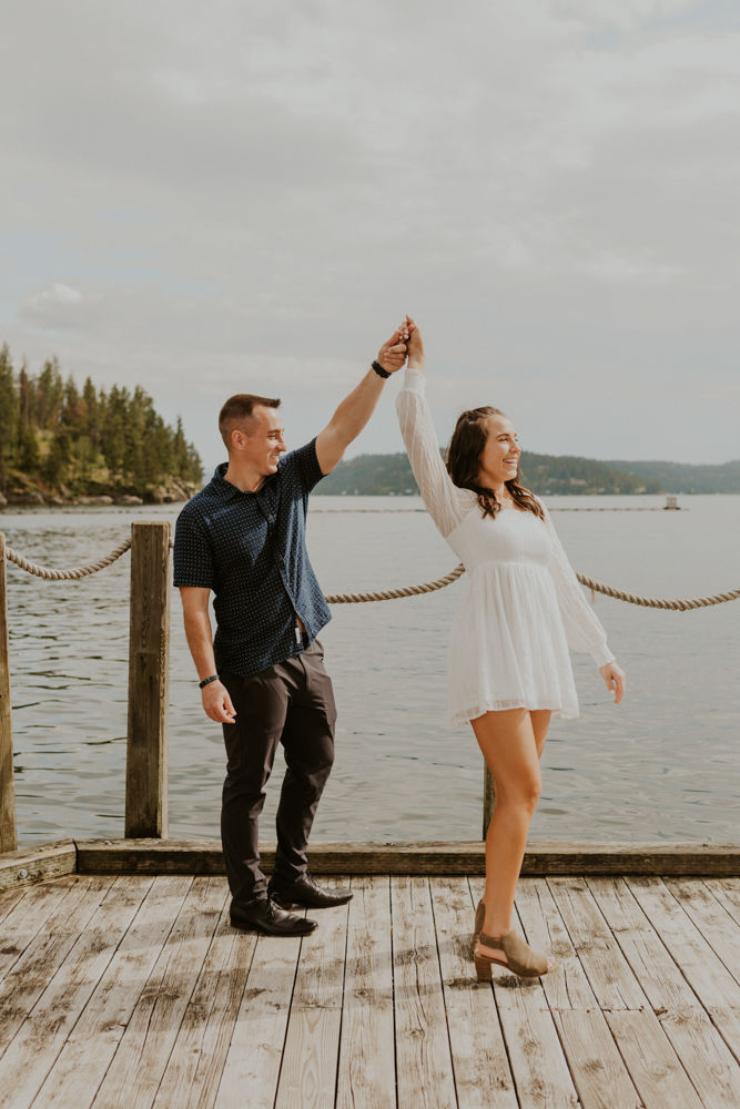 surprise proposal on the coeur d'alene resort boardwalk in north idaho, karlie larson photography