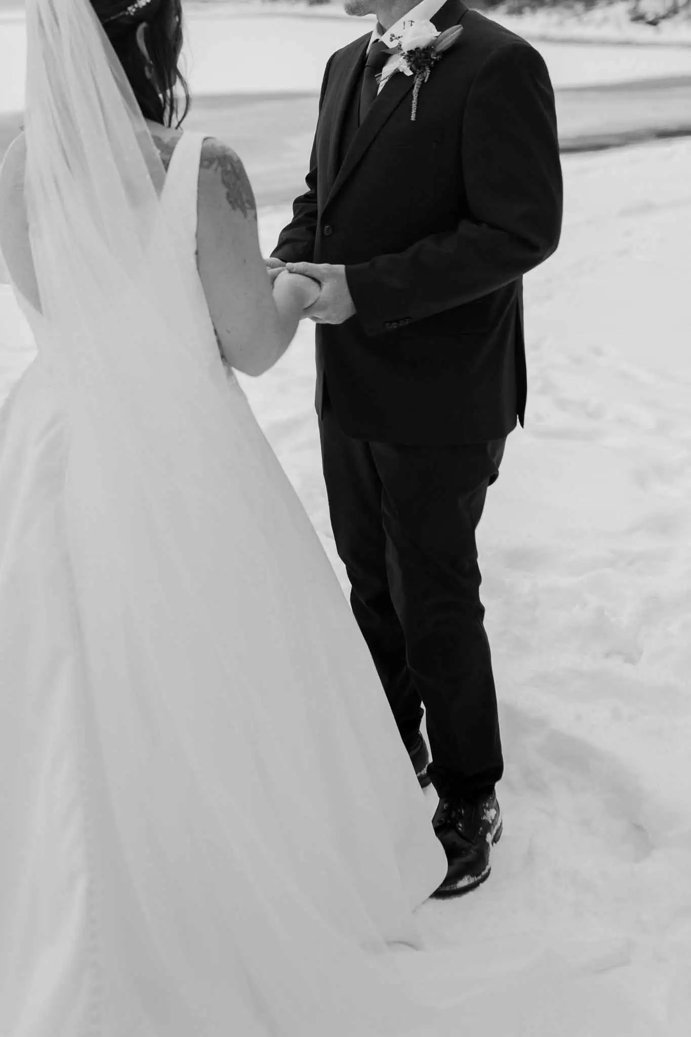 winter elopement ceremony on a beach